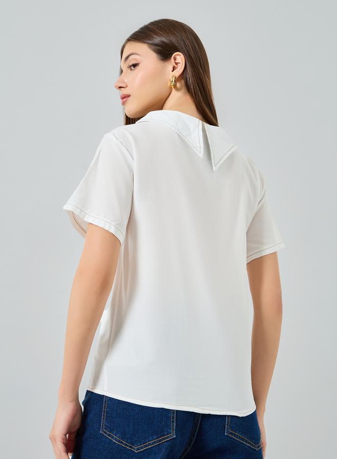 ستايلي بلوزة أبيض بأكمام قصيرة وتفاصيل أزرار - Image 4